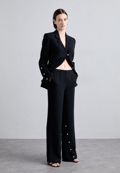 Stine Goya ISAAC CREPE - Hlače - jet black