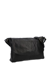 Black leather handbag with a fold-over flap, adjustable strap, and subtle creases; smooth texture with minimalist design and no visible hardware.