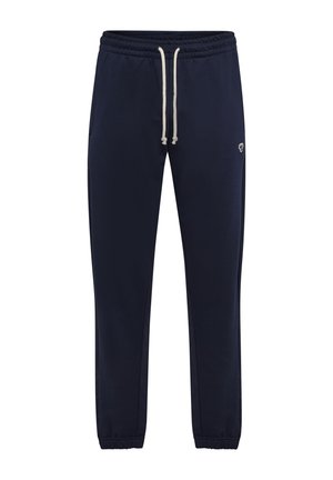 Navy blue sweatpants with an elastic waistband and drawstring, side pockets, and a small logo detail. Soft, textured fabric.