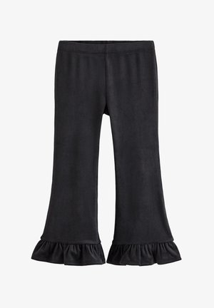 Sorte leggings med vidde, lavet af blødt stof, elastisk taljebånd og flæser ved kanten. Glat tekstur med minimalistisk design.