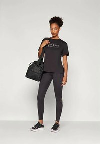 Puma HYROX CLOUDSPUN - Leggings - black
