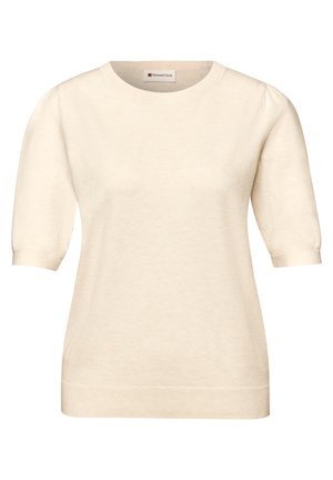 Haut court en tricot de couleur crème avec col rond et manches légèrement bouffantes, doté d'un ourlet ajusté.