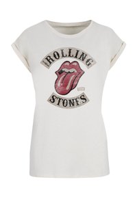 White cotton t-shirt with rolled sleeves featuring a distressed red lips logo and "THE ROLLING STONES" text in black circular design.