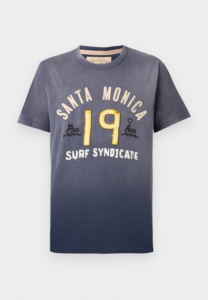 Marineblå bomullst-skjorte med gradienteffekt, prydet med "SANTA MONICA" og "19" i gul og krembroderi, rund hals, korte ermer.