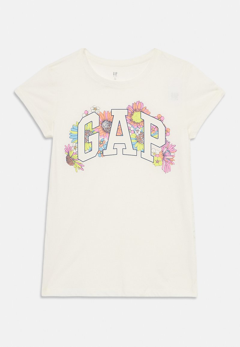 T-shirt bianca a maniche corte con grandi lettere "GAP" circondate da illustrazioni floreali colorate sul fronte.