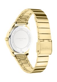 Goldfarbene Edelstahl-Uhr mit einem Gliederarmband, polierter Oberfläche, runder Gehäuseform und einem klaren Glasrücken, der den Markennamen und die Spezifikationen zeigt.