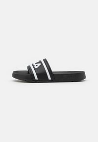 Svarta flip-flops med en bredrem som har vita ränder och logodetalj. Matt yta och strukturerad sula för grepp, designade för avslappnad användning.