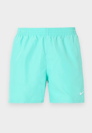 Short de bain turquoise clair à taille élastique avec un petit logo Nike swoosh blanc sur la jambe inférieure droite sur un fond uni.