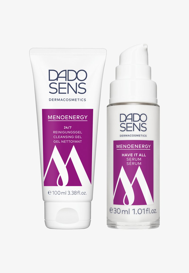 DADO SENS MENOEnergy Reinigungsgel (100 ml) in einer weißen Tube und Serum (30 ml) in einer transparenten Flasche, beide mit lila Akzenten und Logos.