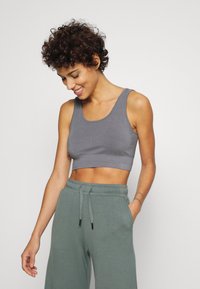 Yogasearcher HADU SEAMLESS BRA - Sutiã desportivo de suporte ligeiro - lavastone