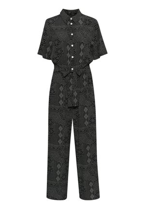 Melnas kombinezons ar īsām piedurknēm, apkakli, priekšējiem pogām un jostu. Visā kombinezonā ir balta ziedu un abstrakta raksts.