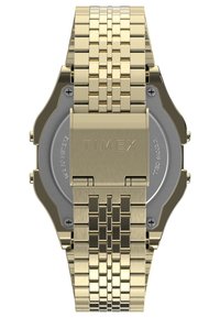 Reloj de acero inoxidable dorado con una correa texturizada y un acabado pulido. Presenta una caja redonda, dos pulsadores y un fondo de caja grabado.