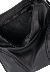 Black leather handbag featuring a textured finish, zippered closure, and interior lining with a repeating logo pattern.