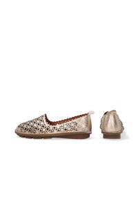 Metallic gold slip-on shoes with intricate laser-cut floral pattern, soft interior lining, and a low rubber sole. Scalloped edge detail at opening.