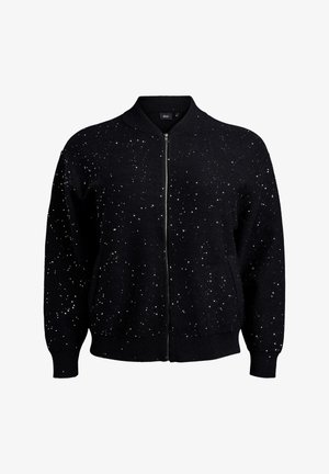 Cárdigan negro con cremallera en la parte delantera, decorado con manchas blancas, puños y dobladillo acanalados. Hecho de una tela suave, que ofrece un ajuste relajado.