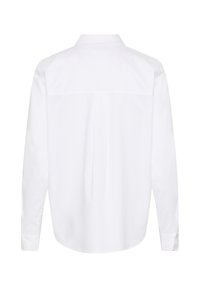 Chemise blanche à manches longues boutonnée, vue de dos, avec un col droit et des poignets boutonnés sur fond blanc.