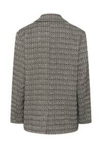 Houndstooth patterned blazer in black and white, featuring a tailored collar, long sleeves, and a straight cut with side slits.