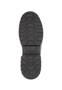 Suela de zapato negra con una superficie texturizada, que presenta surcos y patrones profundos para un mejor agarre. Las marcas incluyen "REVELUTION" y la talla 37.