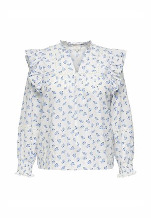 Valge pikkade varrukatega pluus sinise lillemustriga, volangikate õlgadega, soonikkoes varrukapääri ja V-kaelusega, mis on kaunistatud peene pitsipitsiga.