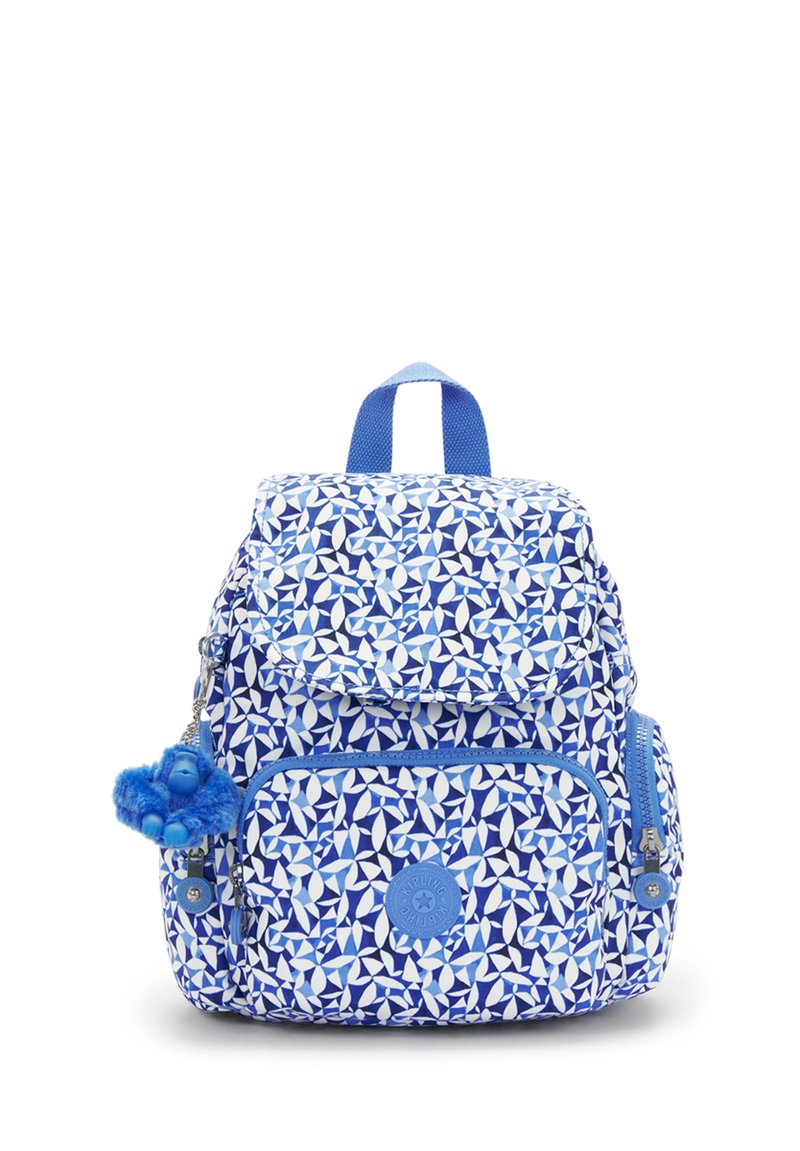 Blue patterned backpack with geometric shapes, fabric exterior, front zip pocket, and a blue fluffy keychain accessory. Adjustable straps.