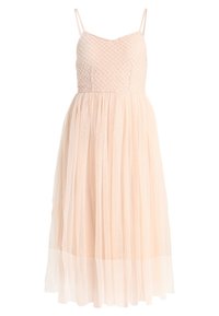 Bledě růžové šaty s přiléhavým, strukturovaným korzetem a ramínky na spagetti, které mají splývavou, vrstvenou tylovou sukni sahající do půlky lýtek.