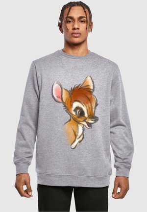 Gray sweatshirt featuring a colorful illustration of a cartoon deer with large eyes and ears on the front. Made from soft, textured fabric.