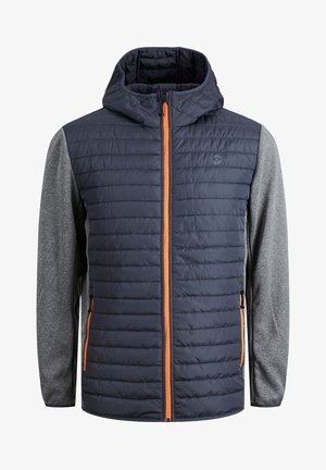 Insulated jacket with a navy quilted body and grey sleeves. Features a zip front with an orange accent, adjustable hood, and side pockets.