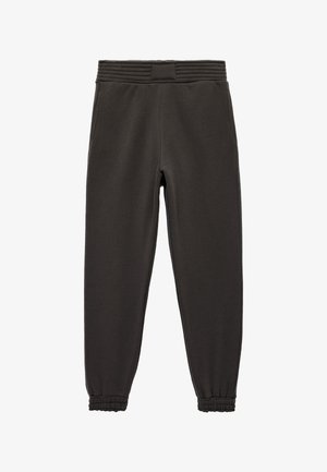 Joggers de mezcla de algodón en gris oscuro, con cintura acanalada, puños elásticos y bolsillos laterales. Textura suave, diseño ajustado.