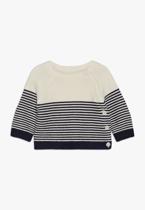 Kremowy i granatowy sweter niemowlęcy z dzianiny z poziomymi paskami na dolnej części ciała i rękawach, z pięcioma guzikami ułożonymi wzdłuż prawego ramienia i boku.