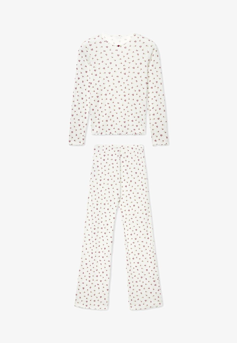 Pigiama a maniche lunghe con collo rotondo, realizzato in cotone bianco con una piccola stampa floreale rossa. I pantaloni sono dritti con vita elasticizzata. Tessuto morbido.