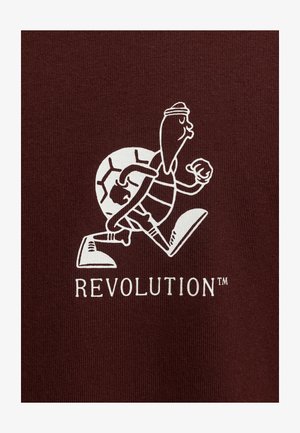 Maroon fabric featuring a white graphic of a turtle wearing a hat and running, with the text "REVOLUTION™" underneath.