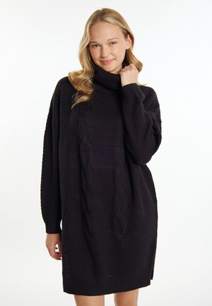 Schwarzes, gestricktes Sweaterkleid mit hohem Rollkragen, lockerer Passform, gerippten Bündchen und Kabelstrickmuster in der Mitte. Strukturiertes Material.