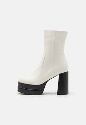 Stivaletti con tacco - off-white