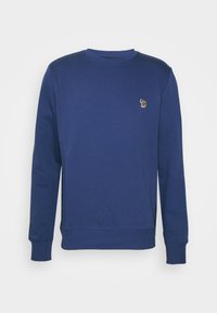 Sudadera azul marino con cuello redondo, mangas largas, puños acanalados y un pequeño detalle bordado colorido en el pecho. Textura suave.