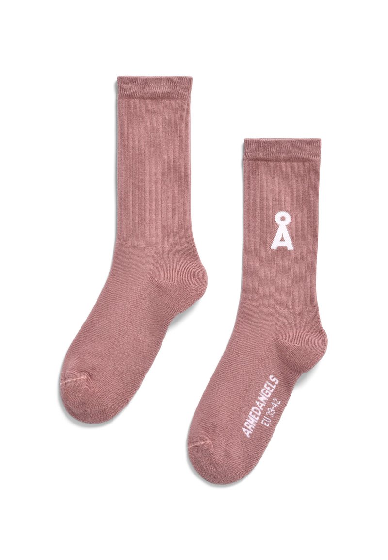 Chaussettes en coton rose à nervures avec logo blanc. Dotées d'une longueur mi-molletonnée, d'un orteil renforcé et d'une texture douce.