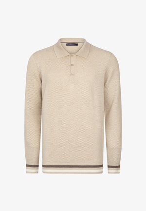 Beežist kedratud polo-sviiter, millel on tekstureeritud muster, kolme nööbiga avamine ja pruunide ning kreemjate triipudega varrukaääred. Pika varrukaga disain.