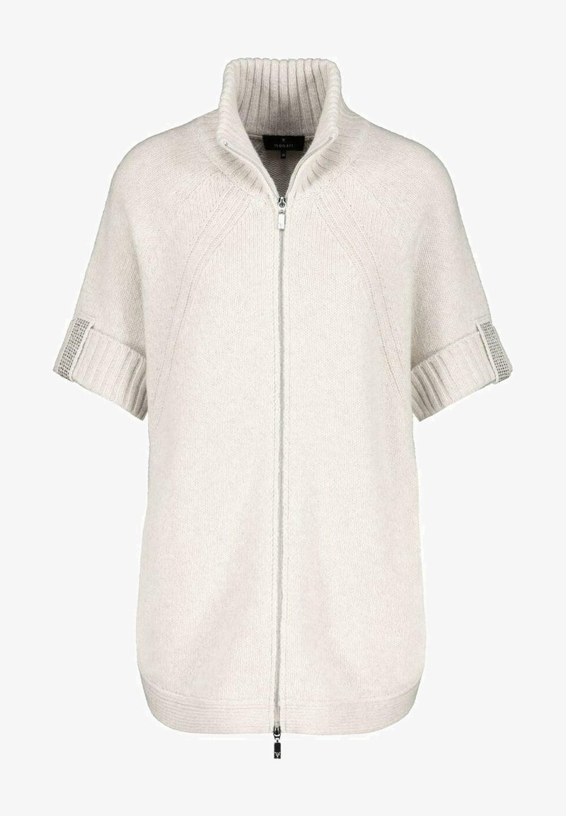 Cardigan court en maille couleur crème avec col haut côtelé et fermeture éclair devant.