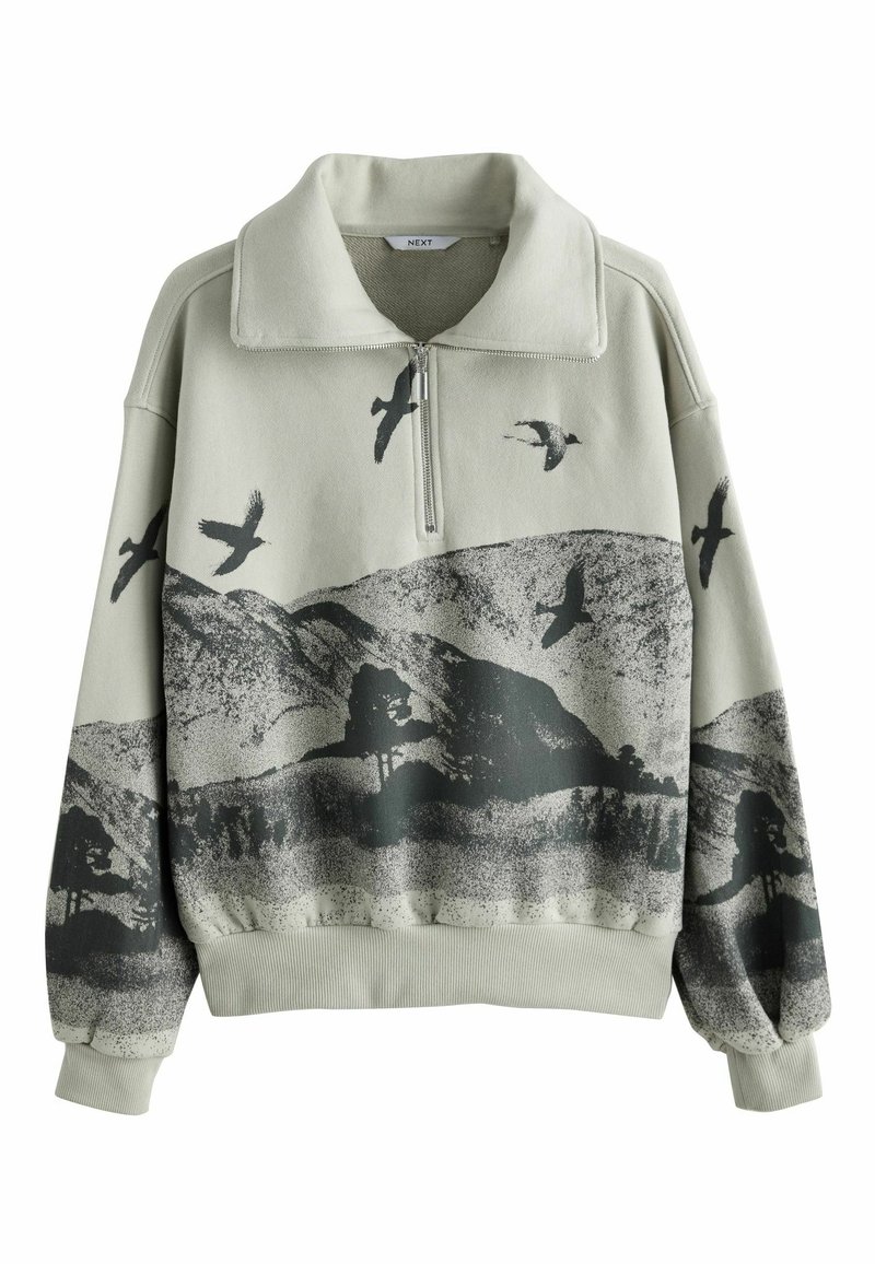 Sweat-shirt gris clair zippé avec impression noire d'oiseaux en vol et de paysage montagneux sur le devant et les manches.