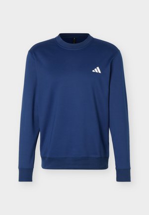 Navy blue long-sleeve crewneck sweatshirt with ribbed cuffs and hem, featuring a small white Adidas logo on the left chest.