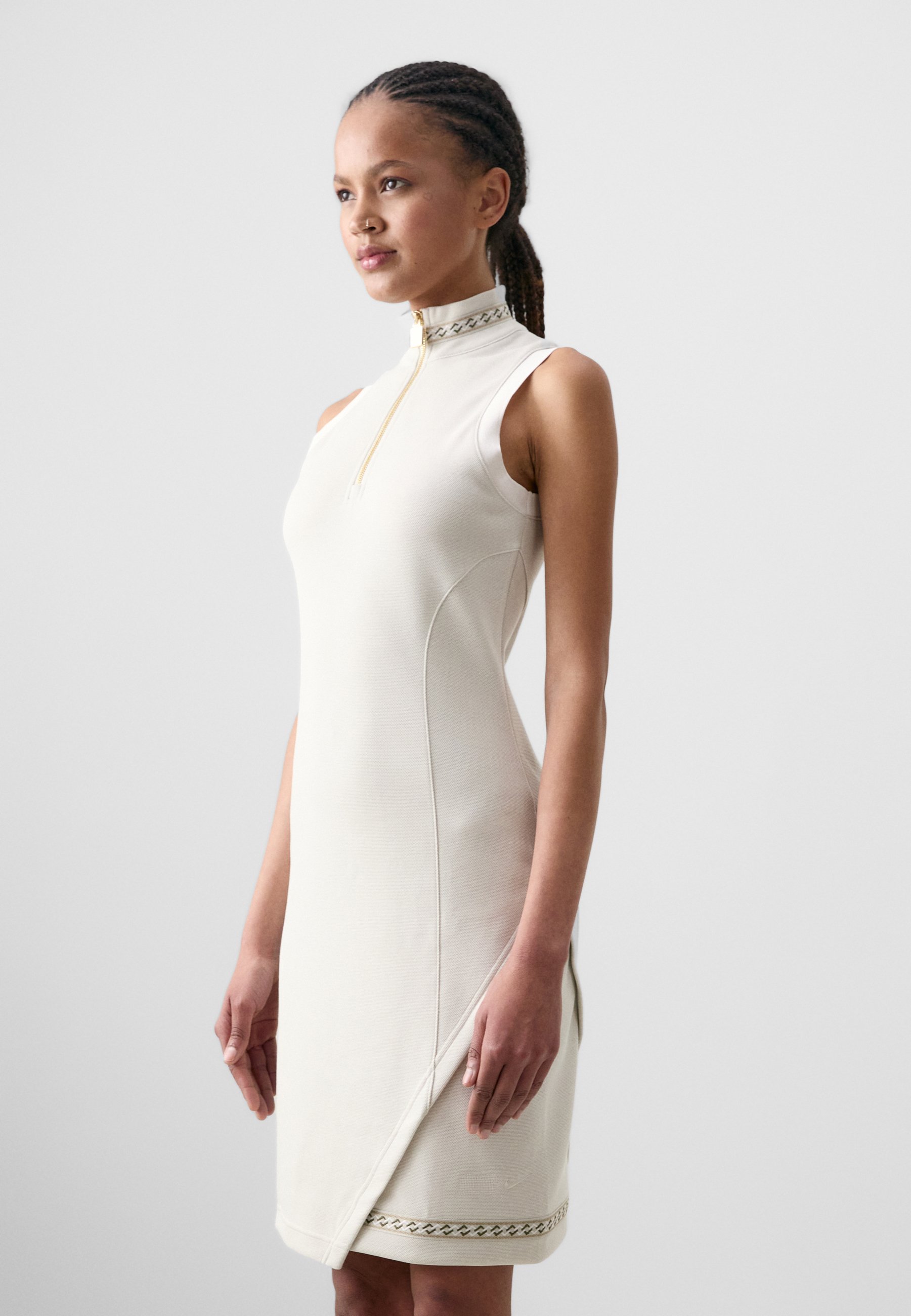 white and gold nike dress