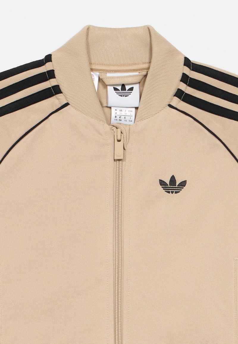 adidas Originals SST TRACKSUIT-KIDS UNISEX SET - Tracksuit - stone  khaki/light brown - Zalando.co.uk