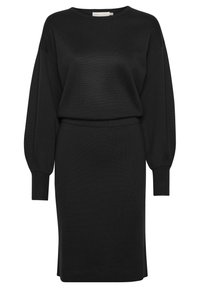 Robe noire en tricot côtelé, avec un col rond, des manches oversize et une taille cintrée, dotée d'une longueur moyenne et d'une fente latérale.