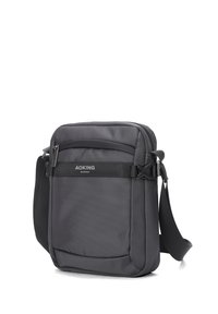 Borsa a tracolla grigio scuro realizzata in tessuto testurizzato, con tasca frontale con zip, tracolla regolabile e logo discreto.