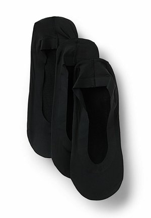 Ballerines noires en tissu doux, avec un bout arrondi, un design assez bas et des bords élastiques pour un ajustement parfait. Trois paires empilées.