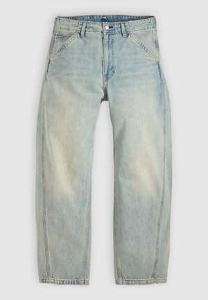 Jeans larghi color azzurro chiaro in denim. Presentano cinque tasche, chiusura con bottone e aree sbiadite per un aspetto vissuto.