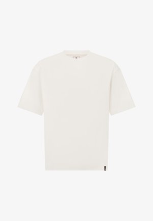 Valkoinen puuvillapaita, jossa on rento leikkaus, pyöreä kaula-aukko ja lyhyet hihat. Siinä on pieni musta logo-tagi alahelmassa.