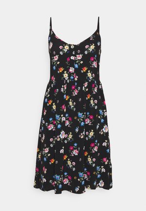 Vestido floral con fondo negro, adornado con pequeñas flores multicolores. Diseñado con tirantes finos, escote en V y una falda acampanada.