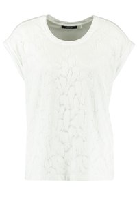 Top blanco de manga corta con patrón texturizado, escote redondo y puños enrollados. Fabricado con un tejido ligero y de corte relajado.