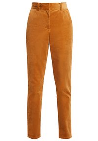 Kamelbuks i dämpad orange med ribbad textur, rak skärning och framfickor. Bältesöglor och en slät midjeband ingår.