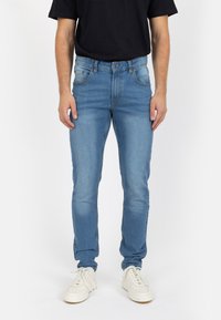 MR RED SUPERSTRETCH - Slimfit džínsy - washed medium blue